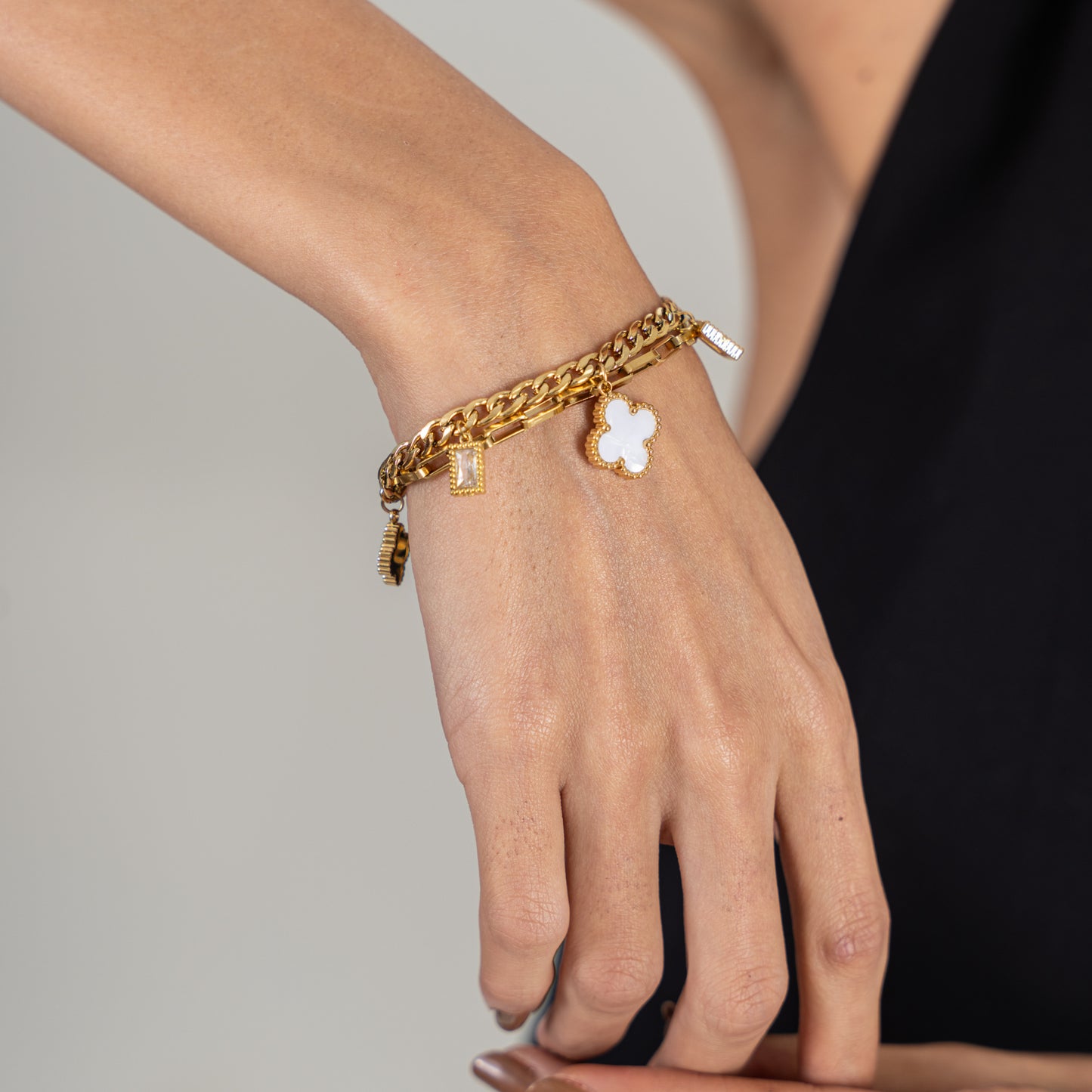Clover Crystal Dainty Bracelet in hand
